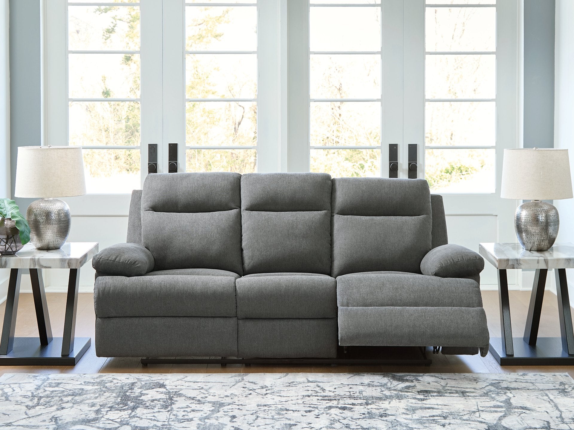 Side-Swipe Reclining Sofa with Drop Down Table